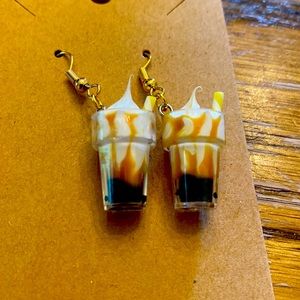 Cute yellow milkshake earrings with silver looking wires and random gift bag.